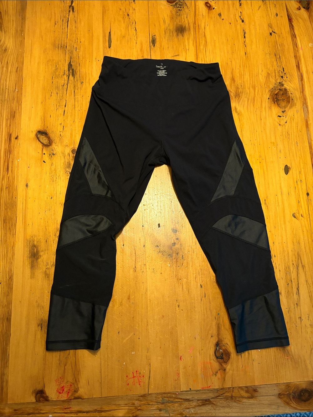 Sweaty Betty Black Capri Leggings with Mesh Details